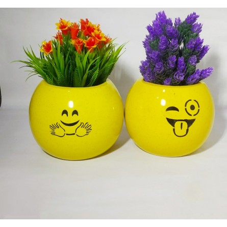 Pair Of Smiley Ceramic Pots